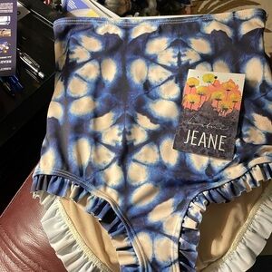 Kortni Jeane Tie-Dye Ruffle Swim Bottoms. New with tag. Girl’s size 10-11 age 12